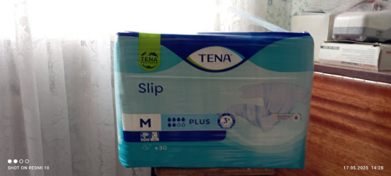 Памперсы фирмы TENA р-р М, 11 упаковок.  600гр. за упаковку.