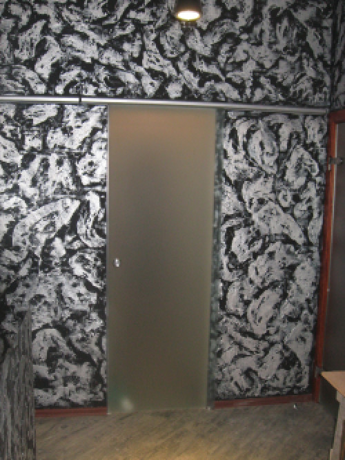 розсувні скляні двері 